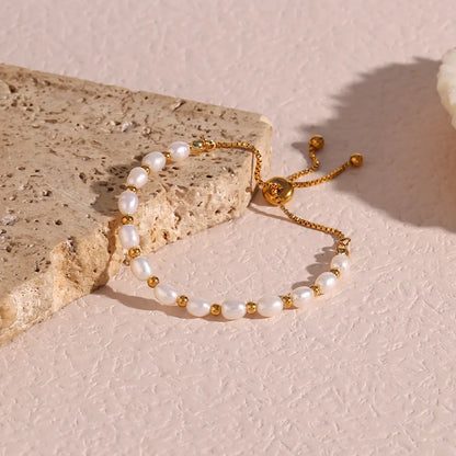 Elegant Perle og Guld Armbånd