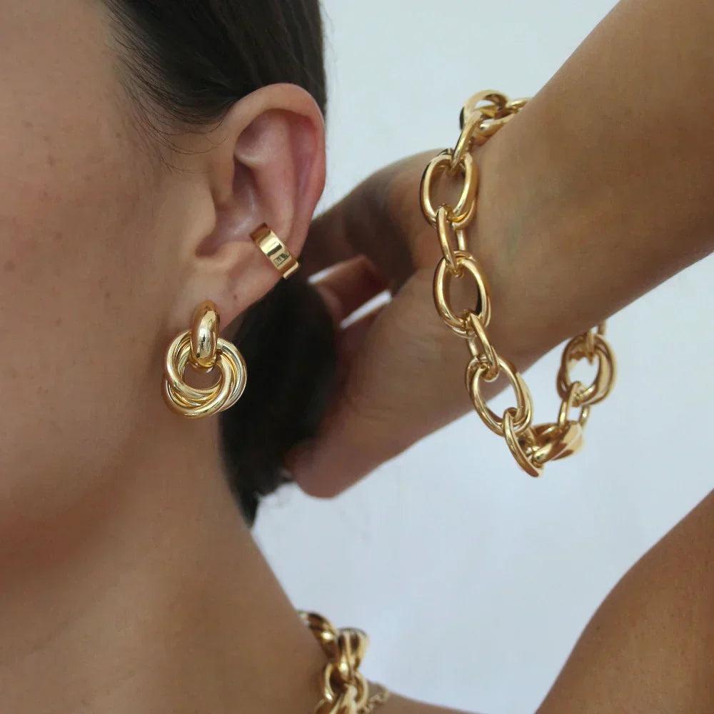 Statement Interlocking Øreringe | Guld