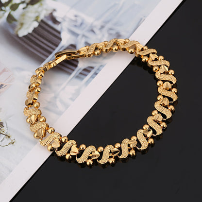 Lily Ornate Bølge Armbånd | Guld